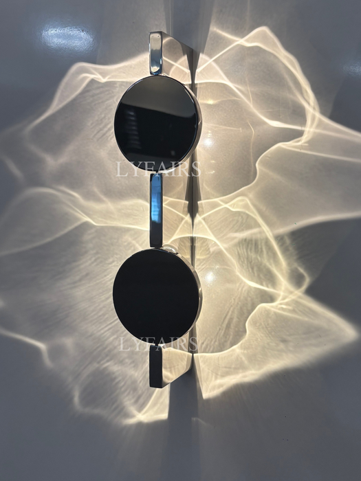 Casora FlowLuxe Ripple LED Wall Light - hero, concentric ripples illuminated