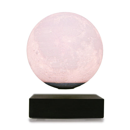 Casora Levitating Moon Lamp - hero shot, magnetic floating moon above walnut base